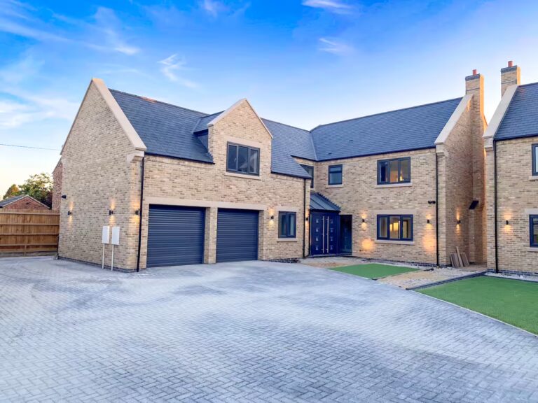 church street new build frontage grass